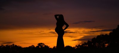Maternity Silhouette Portrait with Dramatic Sky